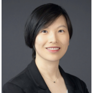 Smiling woman wearing a black blazer