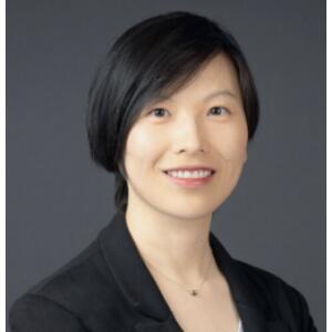 Smiling woman wearing a black blazer